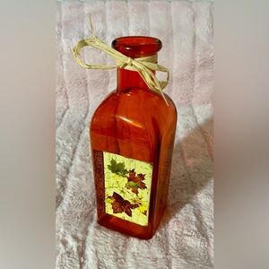 Amber Glass Bottle with Leaf Design